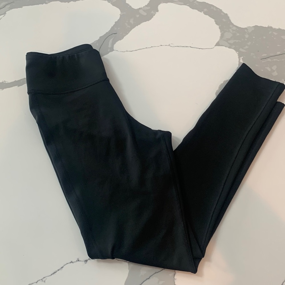 Never worn Reebok speedwick full length leggings. Skinny fit.